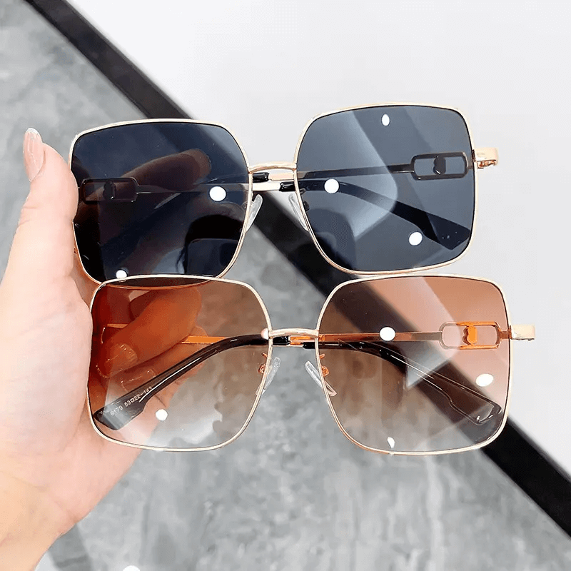 https://www.dlsunglasses.com/wholesale-large-frame-candy-color-metal-cutout-fashion-sunglasses-shades-product/